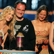 Daryl Hannah with Director Quentin Tarantino accepting the award for Best Fight Scene for Kill Bill. Vol. 2. Hannah claims that she told Tarantino about Weinstein, and he did nothing. Image via Getty.